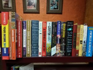 Shelf of new books