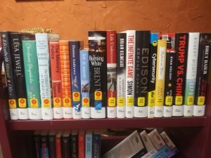 shelf of new books